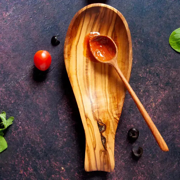 Beautifully crafted Tunisian olive wood spoon rest, designed to keep countertops clean while cooking.