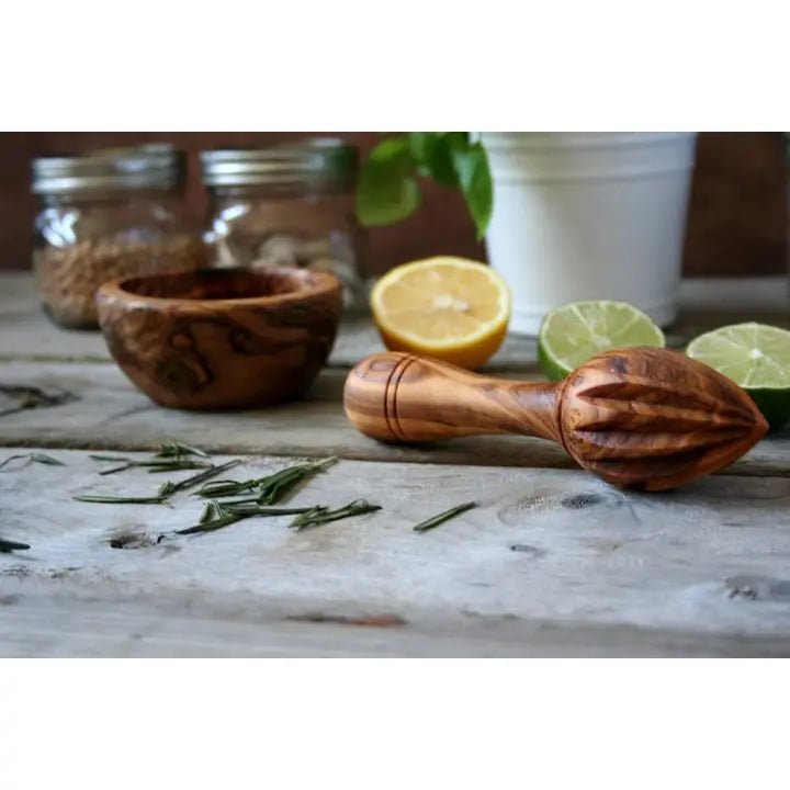 Handmade Tunisian olive wood citrus reamer, ideal for extracting fresh lemon, lime, and orange juice with ease.