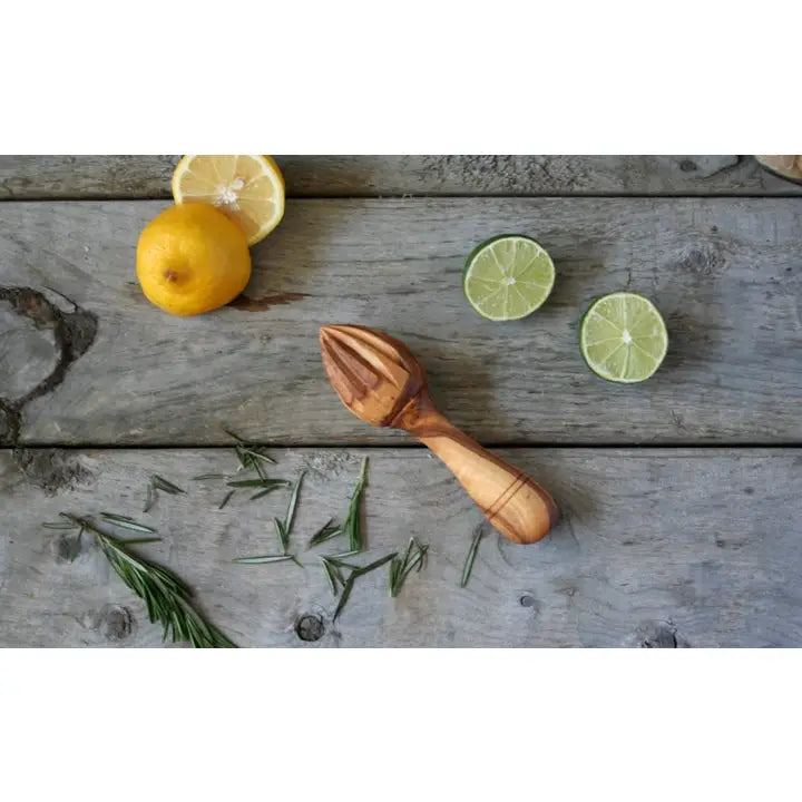 Handmade Tunisian olive wood citrus reamer, ideal for extracting fresh lemon, lime, and orange juice with ease.