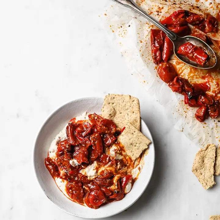 Authentic organic Tunisian harissa paste with rich spices and bold flavors, perfect for adding heat to Mediterranean dishes.