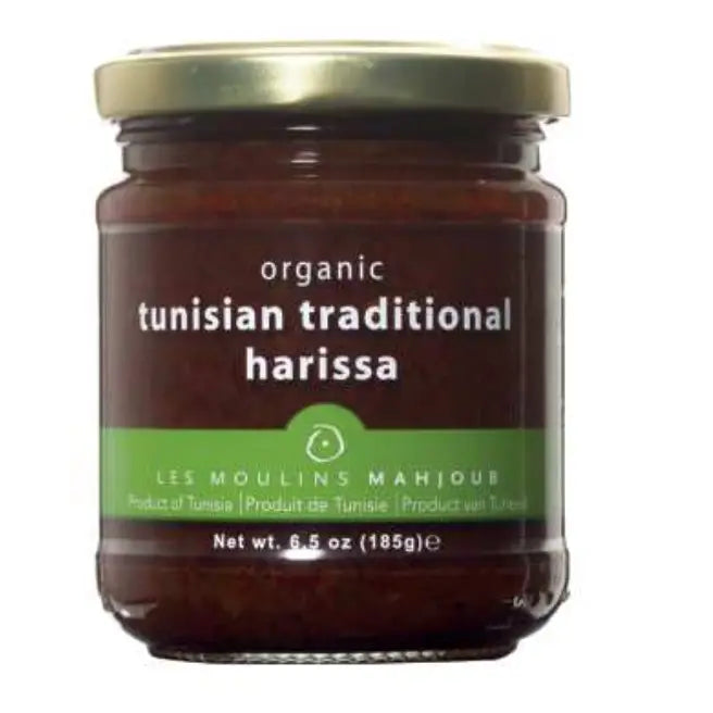 Authentic organic Tunisian harissa paste with rich spices and bold flavors, perfect for adding heat to Mediterranean dishes.